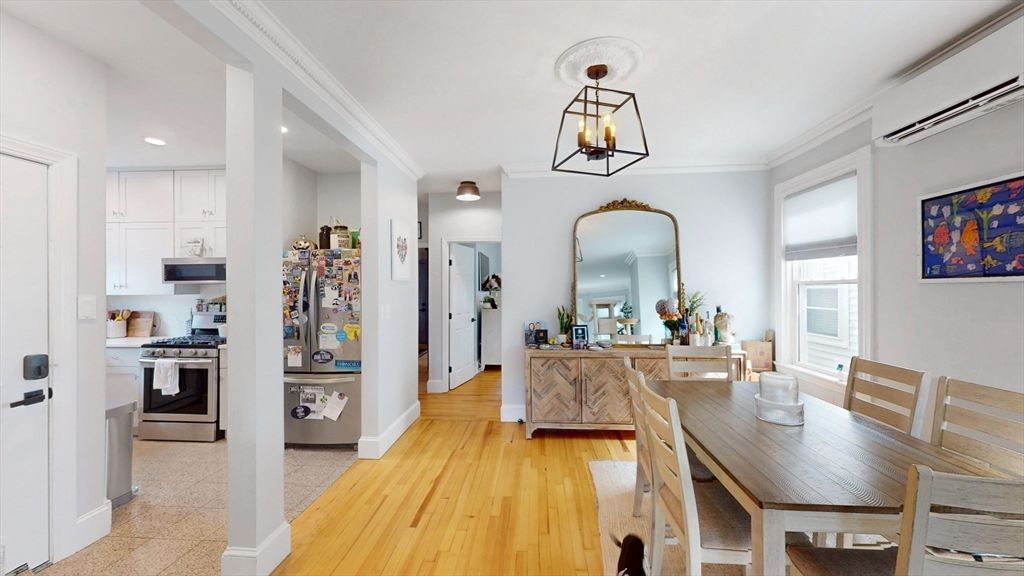Dining room, Interior, Kitchen, Pendant Lights, Recessed Lighting, Stainless Steel Appliances, Wood Texture Flooring
