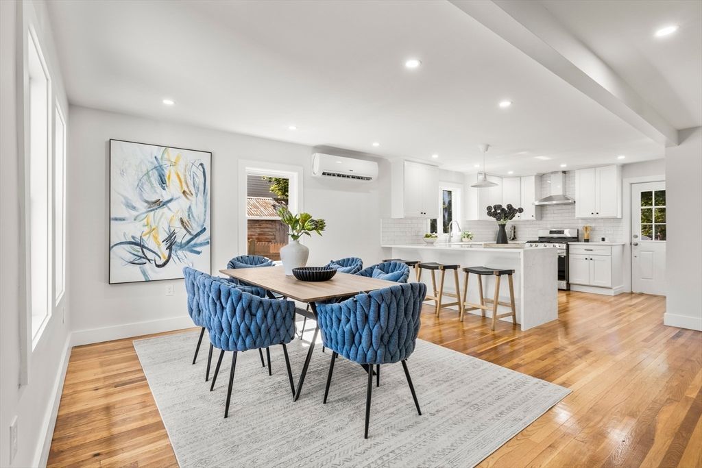 Dining room, Interior, Kitchen, Pendant Lights, Recessed Lighting, Stainless Steel Appliances, Wood Texture Flooring