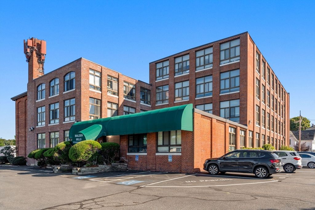 Exterior, Facade, Brick Facade, Condo Building