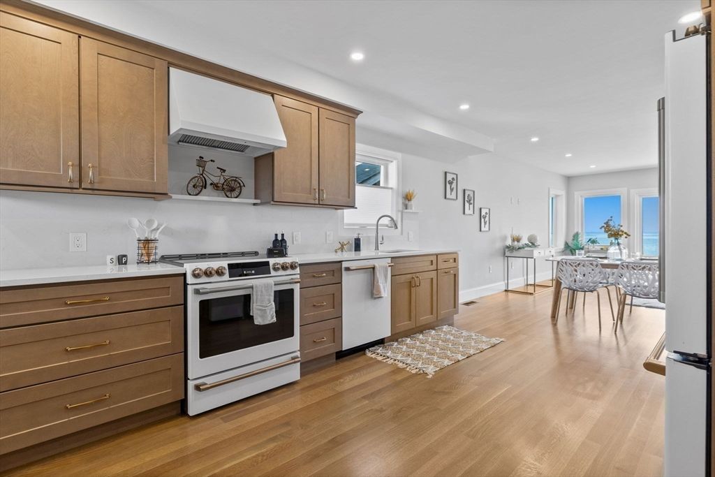 Dining room, Interior, Kitchen, Recessed Lighting, Stainless Steel Appliances, Wood Texture Flooring