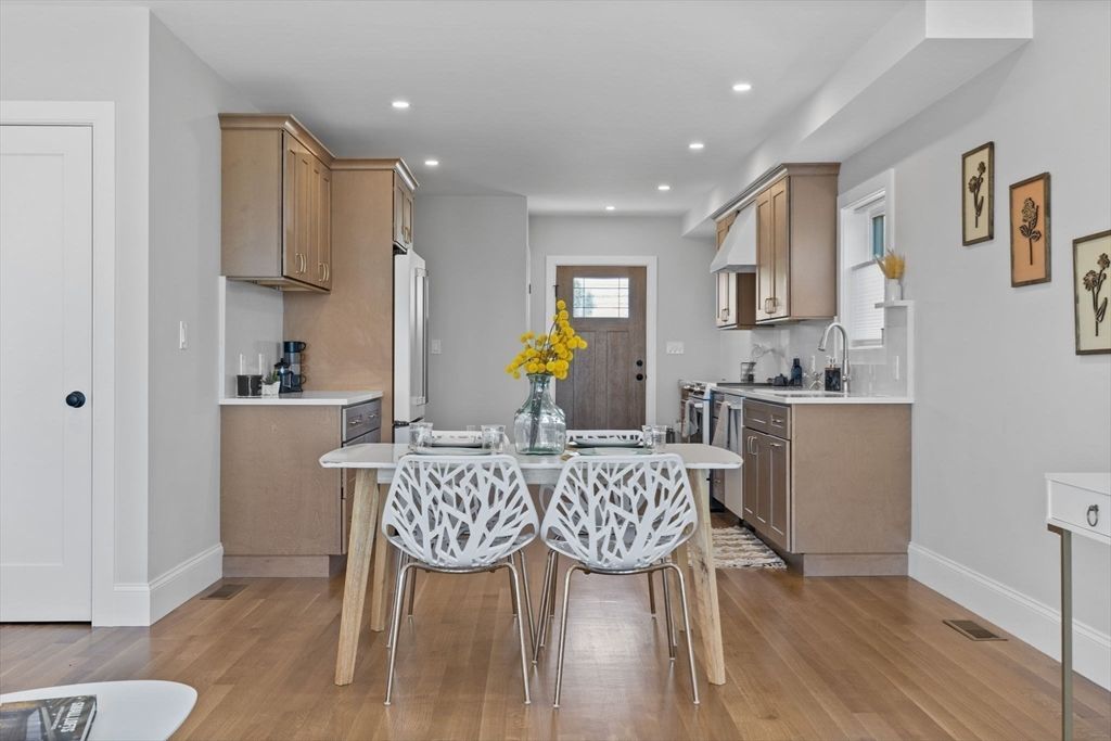 Dining room, Interior, Kitchen, Recessed Lighting, Stainless Steel Appliances, Wood Texture Flooring