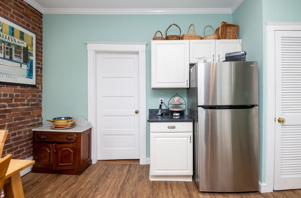 Interior, Kitchen, Stainless Steel Appliances, Stone Walls, Wood Texture Flooring