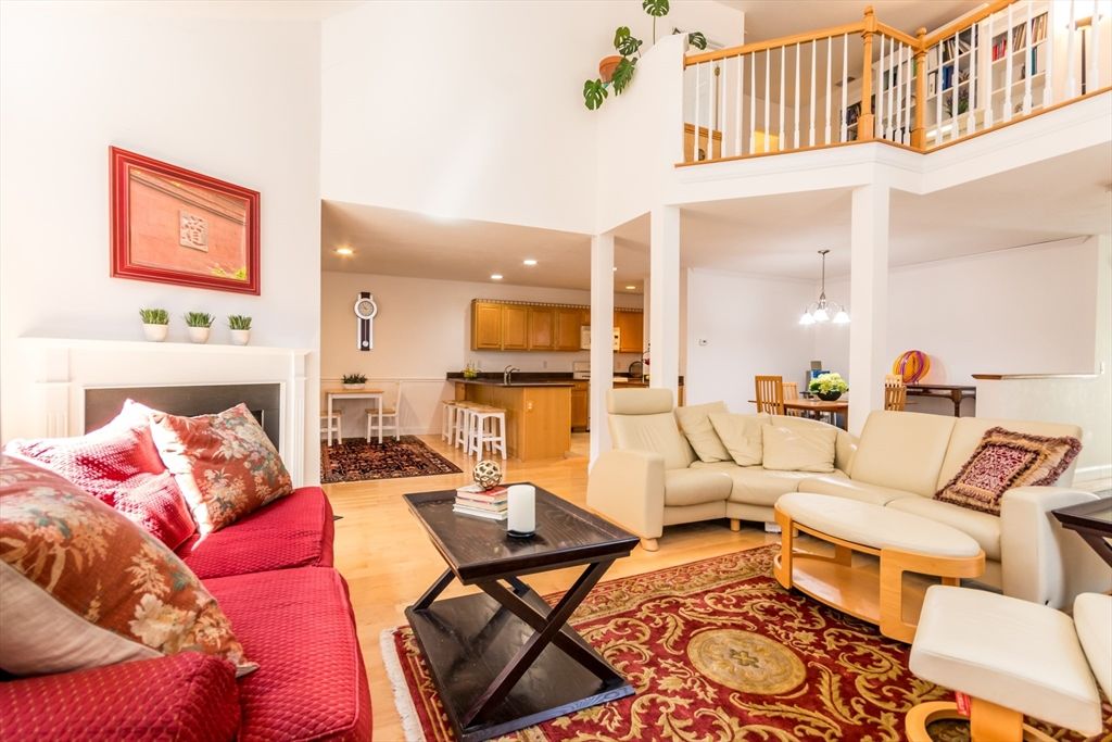 Dining room, Fireplace, Interior, Living room, Pendant Lights, Recessed Lighting, Wood Texture Flooring