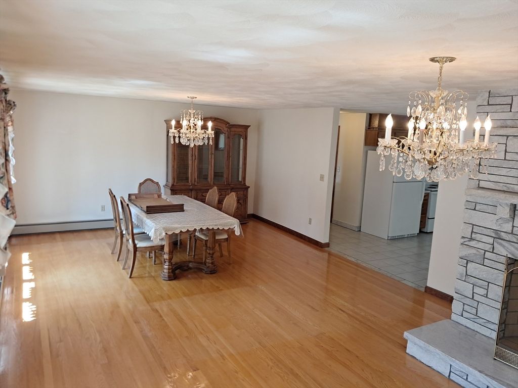 Chandelier, Dining room, Fireplace, Interior, Wood Texture Flooring