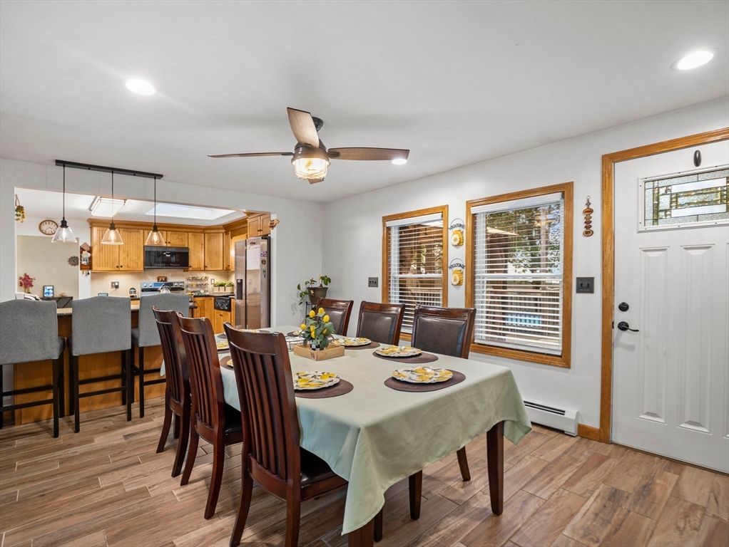 Dining room, Interior, Kitchen, Pendant Lights, Recessed Lighting, Stainless Steel Appliances, Wood Texture Flooring