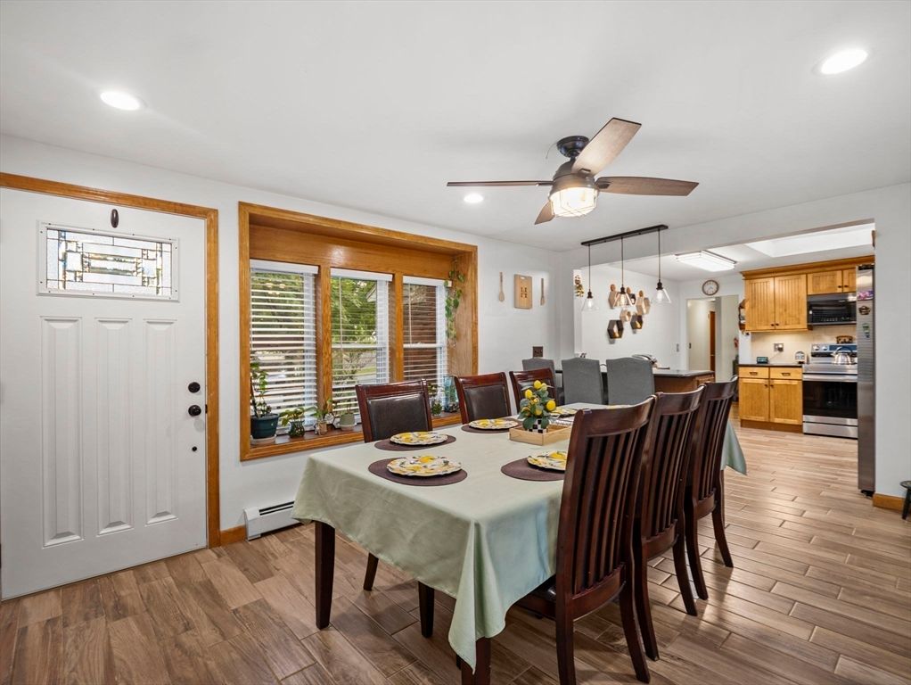 Dining room, Interior, Kitchen, Pendant Lights, Recessed Lighting, Stainless Steel Appliances, Wood Texture Flooring