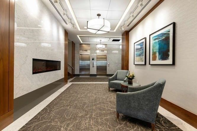 Elevator, Fireplace, Interior, Marble Walls, Pendant Lights