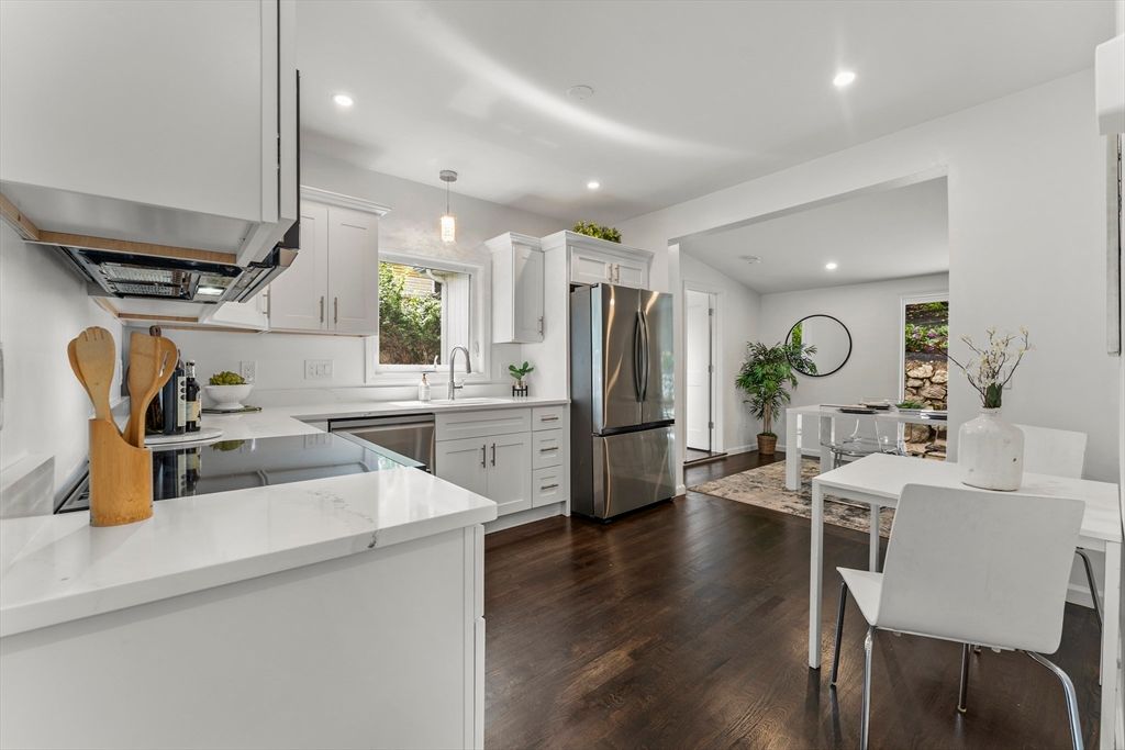 Dining room, Interior, Kitchen, Pendant Lights, Recessed Lighting, Stainless Steel Appliances, Wood Texture Flooring