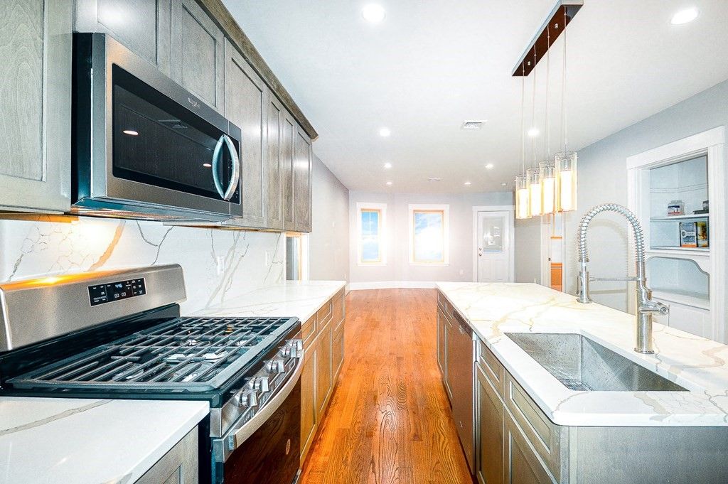 Interior, Kitchen, Pendant Lights, Recessed Lighting, Stainless Steel Appliances, Wood Texture Flooring