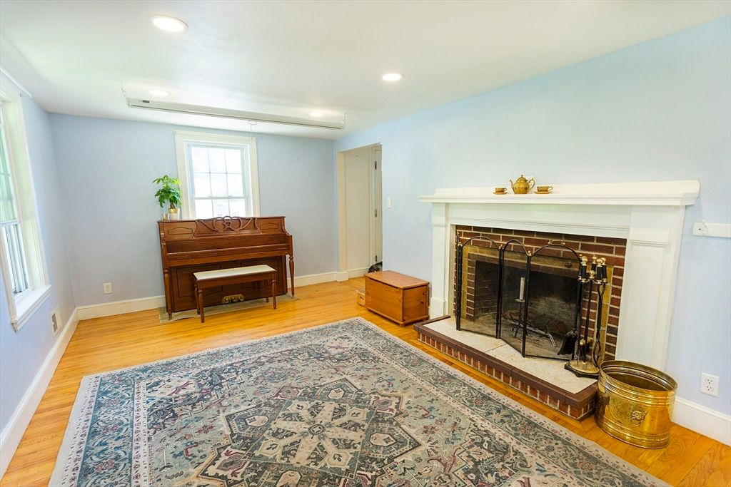 Fireplace, Interior, Piano, Recessed Lighting, Wood Texture Flooring