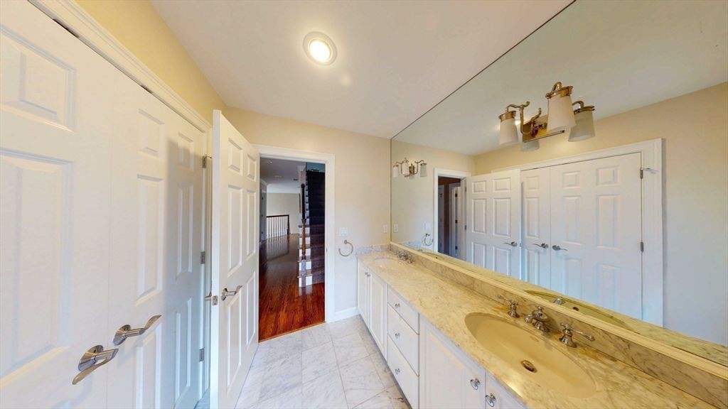 Bathroom, Dual Sink Vanities, Interior, Marble, Recessed Lighting, Wood Texture Flooring
