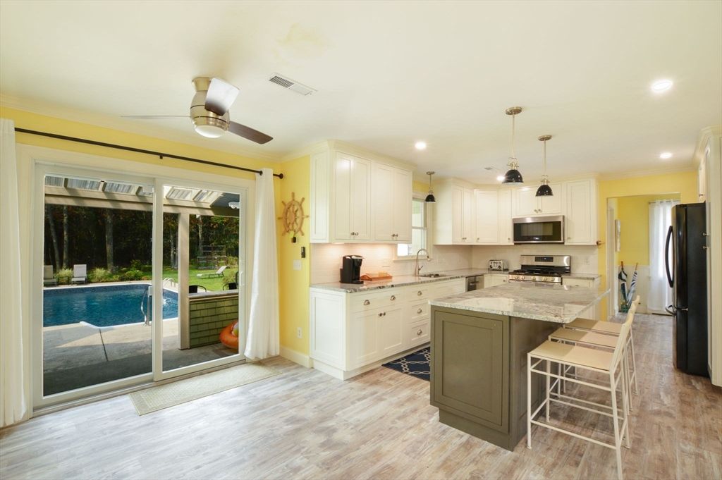 Interior, Kitchen, Pendant Lights, Recessed Lighting, Stainless Steel Appliances, Wood Texture Flooring