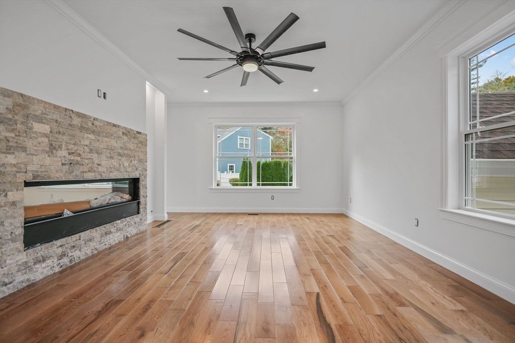 Empty room, Fireplace, Interior, Recessed Lighting, Stone Walls, Wood Texture Flooring