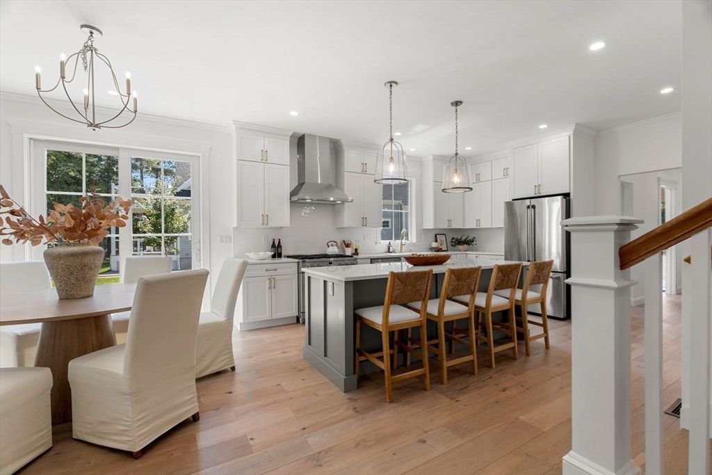 Chandelier, Dining room, Interior, Kitchen, Pendant Lights, Recessed Lighting, Stainless Steel Appliances, Wood Texture Flooring