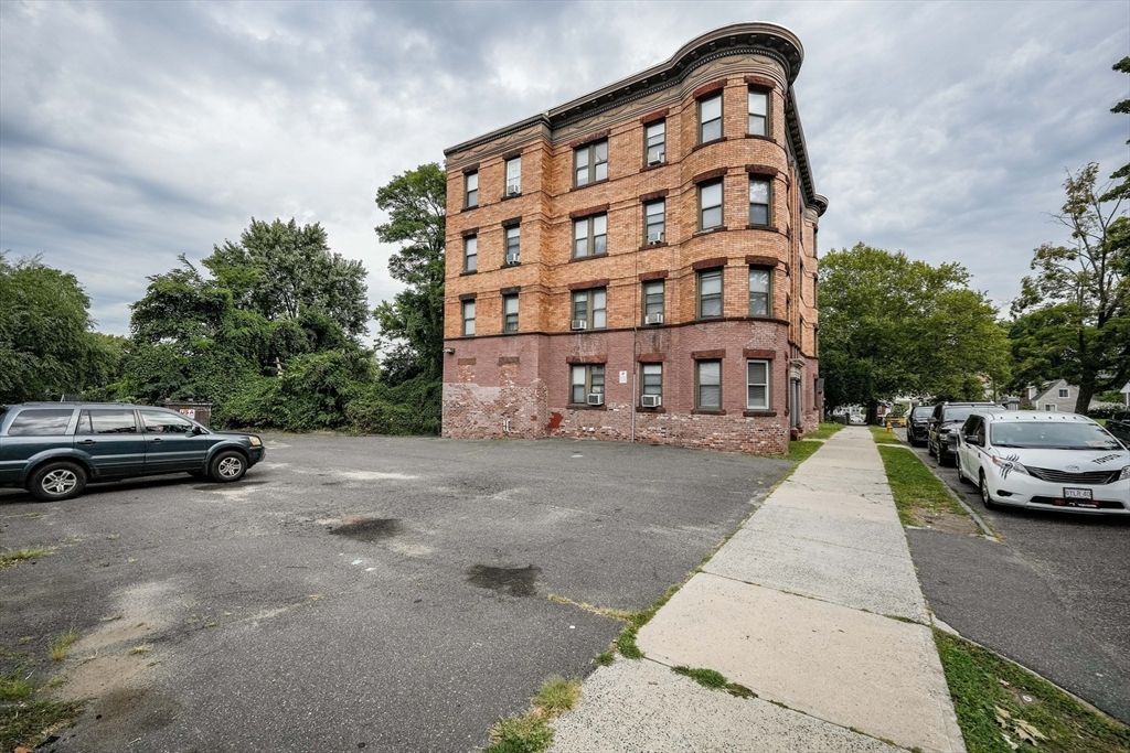 Exterior, Facade, Brick Facade, Condo Building