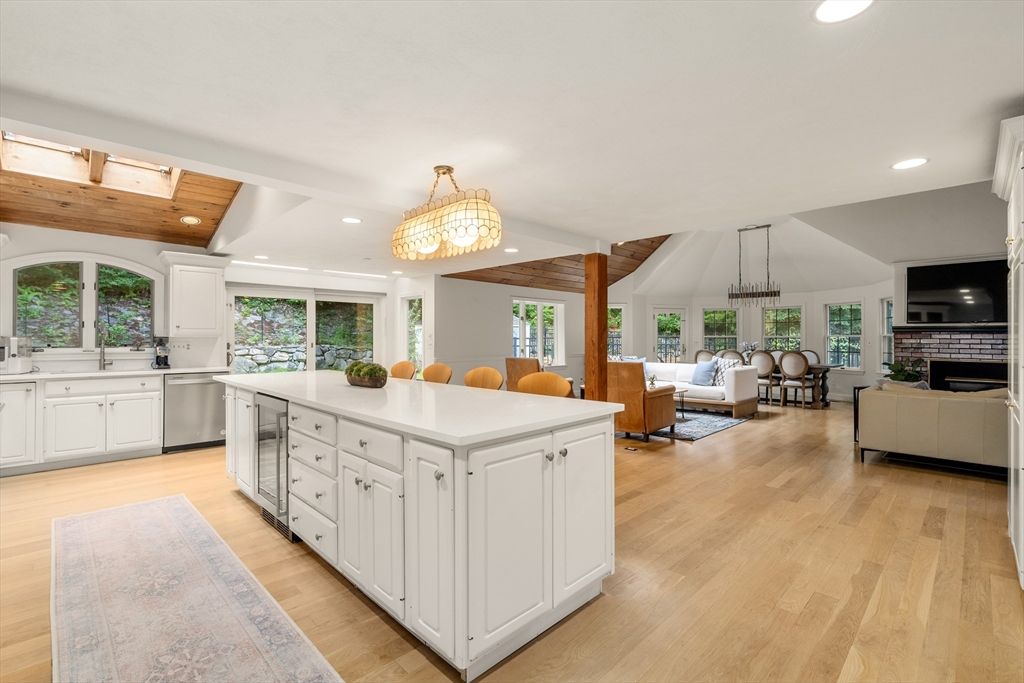 Chandelier, Dining room, Fireplace, Interior, Kitchen, Living room, Pendant Lights, Recessed Lighting, Wooden Beams, Wooden Ceilings, Wood Texture Flooring