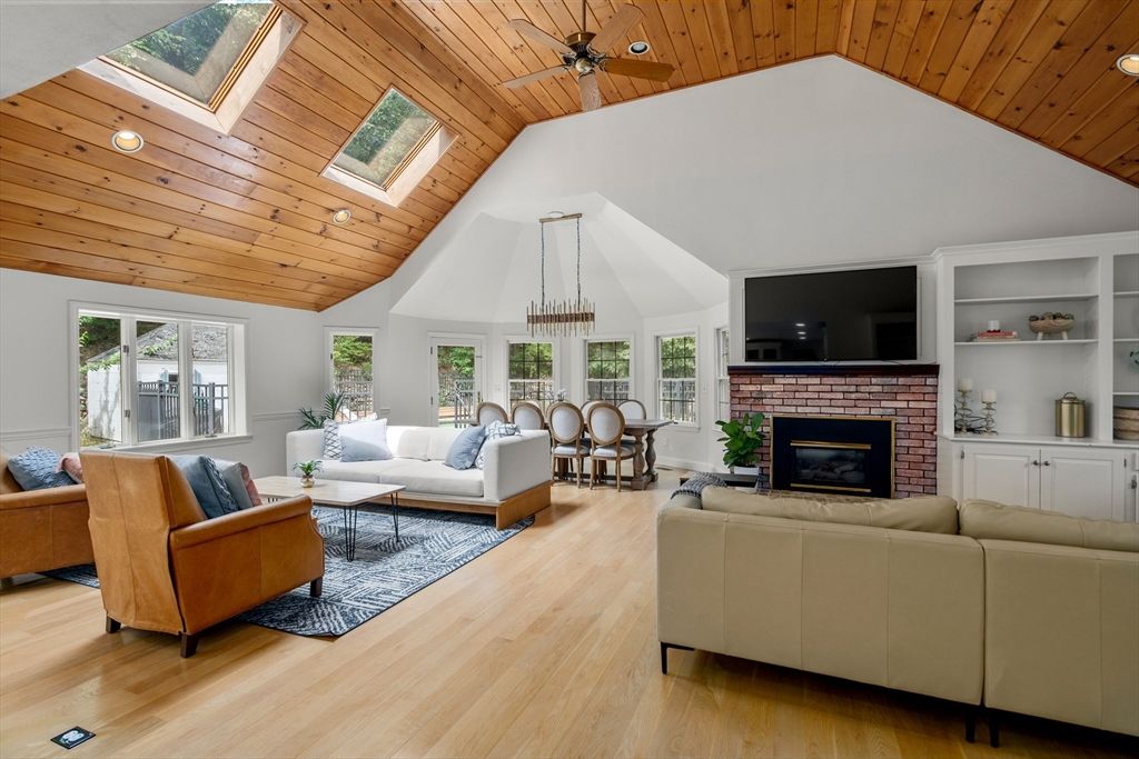 Dining room, Fireplace, Interior, Living room, Pendant Lights, Recessed Lighting, Wooden Ceilings, Wood Texture Flooring