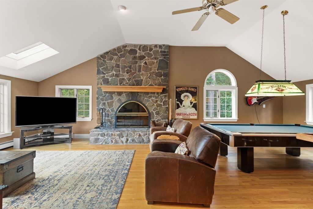 Billiard Table, Fireplace, Game Room, Interior, Pendant Lights, Recessed Lighting, Stone Walls, Wood Texture Flooring