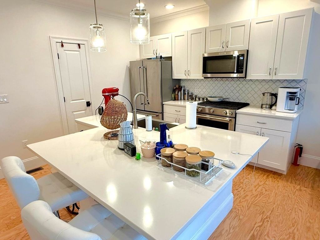 Interior, Kitchen, Pendant Lights, Recessed Lighting, Stainless Steel Appliances, Wood Texture Flooring