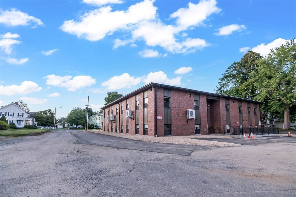 Exterior, Facade, Brick Facade, Condo Building