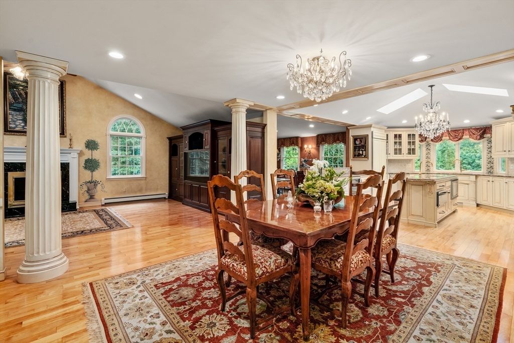 Chandelier, Dining room, Fireplace, Interior, Kitchen, Recessed Lighting, Wood Texture Flooring