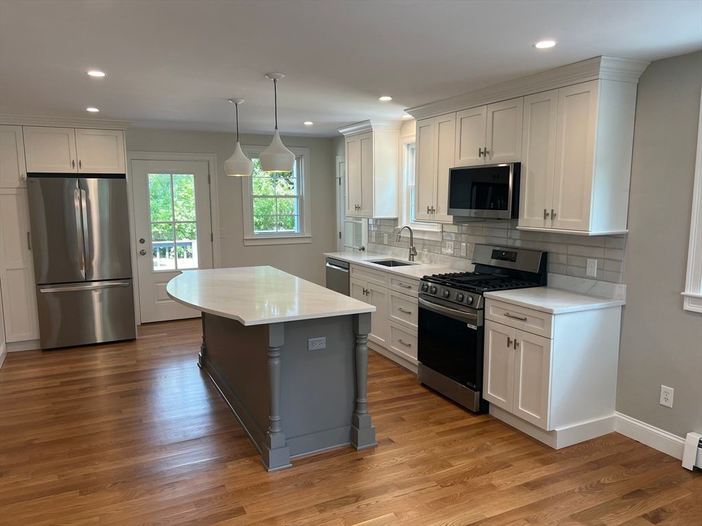 Interior, Kitchen, Pendant Lights, Recessed Lighting, Stainless Steel Appliances, Wood Texture Flooring