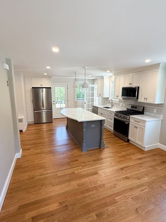 Interior, Kitchen, Pendant Lights, Recessed Lighting, Stainless Steel Appliances, Wood Texture Flooring
