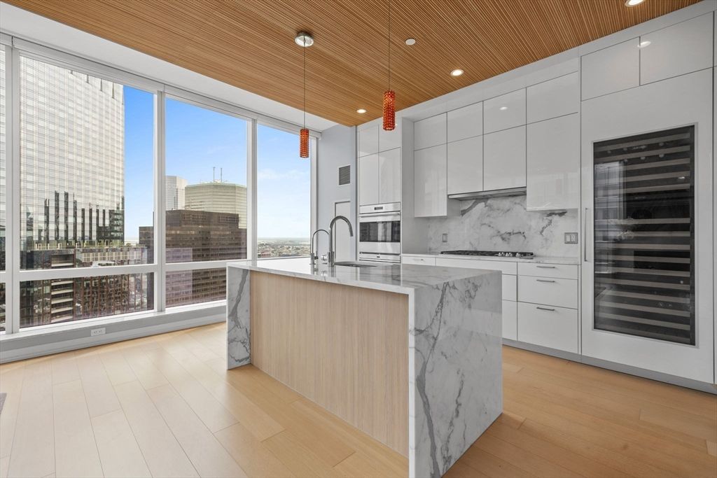 Interior, Kitchen, Marble Walls, Pendant Lights, Recessed Lighting, Stainless Steel Appliances, Wooden Ceilings, Wood Texture Flooring