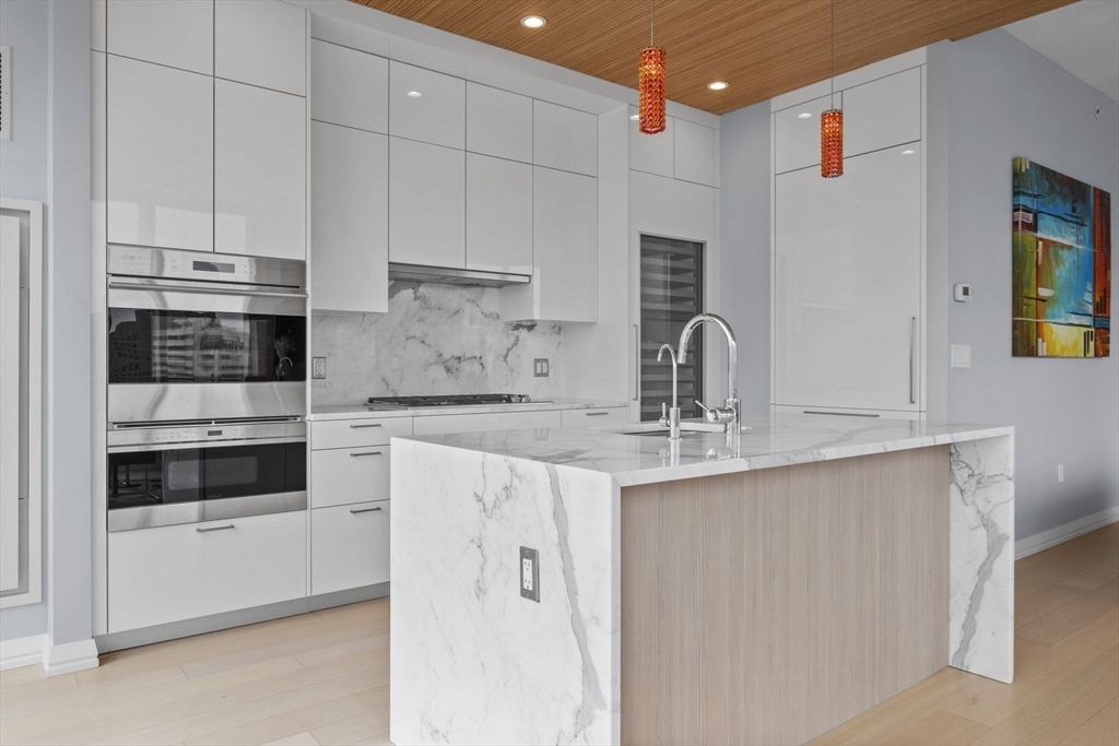 Interior, Kitchen, Marble Walls, Pendant Lights, Recessed Lighting, Stainless Steel Appliances, Wooden Ceilings, Wood Texture Flooring