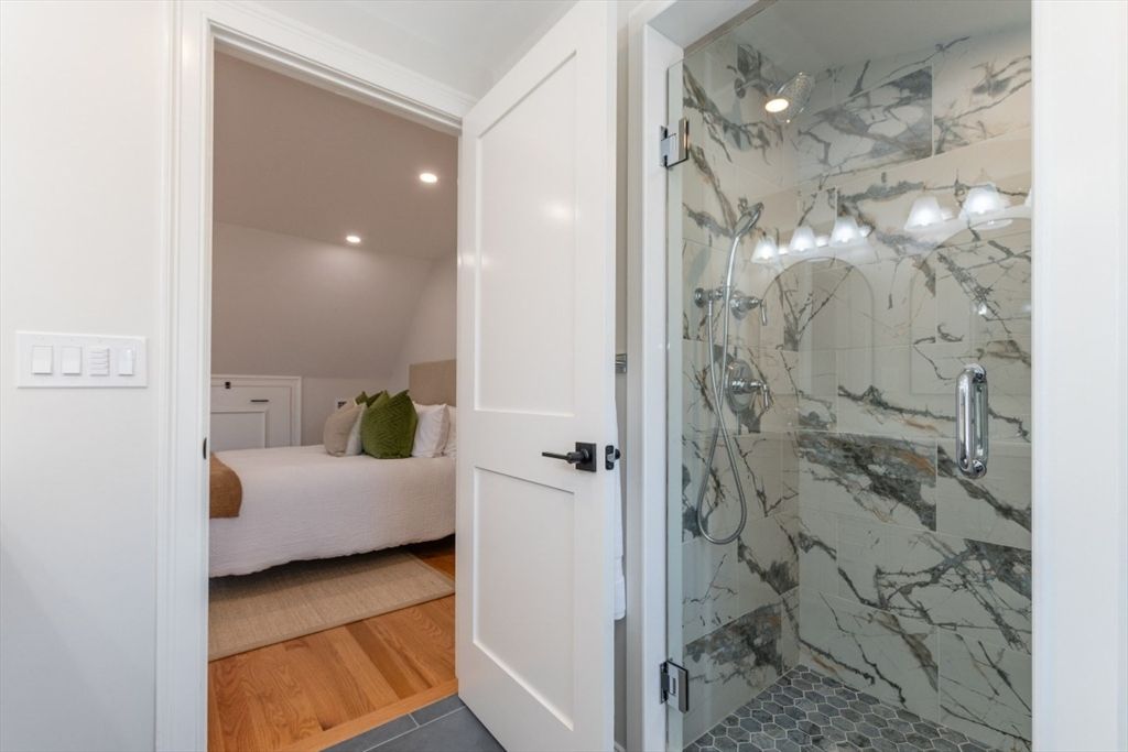 Bathroom, Bedroom, Glass Shower, Interior, Marble Walls, Recessed Lighting, Wood Texture Flooring