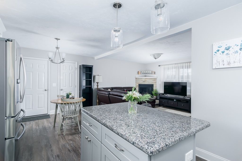 Dining room, Fireplace, Interior, Kitchen, Living room, Pendant Lights, Wood Texture Flooring