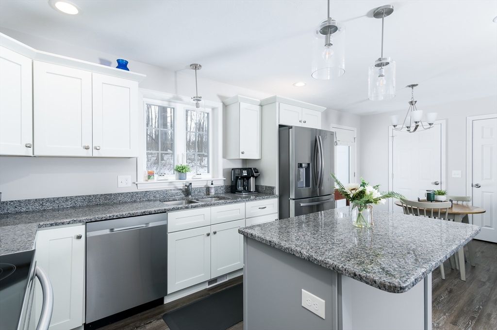 Chandelier, Dining room, Interior, Kitchen, Pendant Lights, Recessed Lighting, Stainless Steel Appliances, Wood Texture Flooring