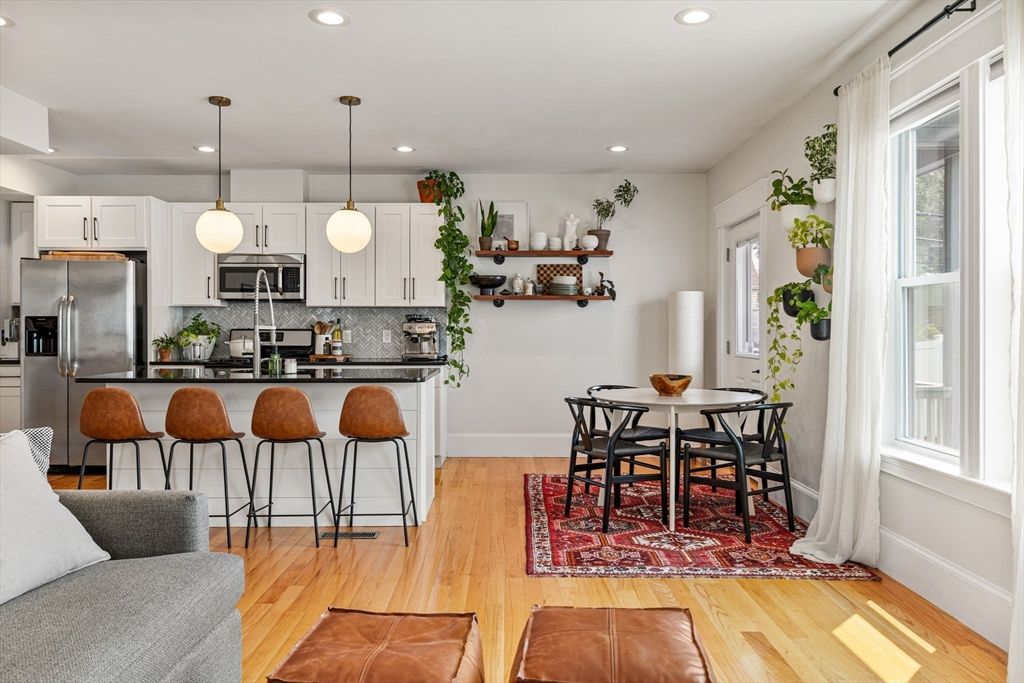 Dining room, Interior, Kitchen, Pendant Lights, Recessed Lighting, Stainless Steel Appliances, Wood Texture Flooring