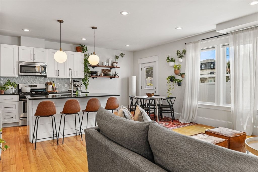 Dining room, Interior, Kitchen, Living room, Pendant Lights, Recessed Lighting, Stainless Steel Appliances, Wood Texture Flooring
