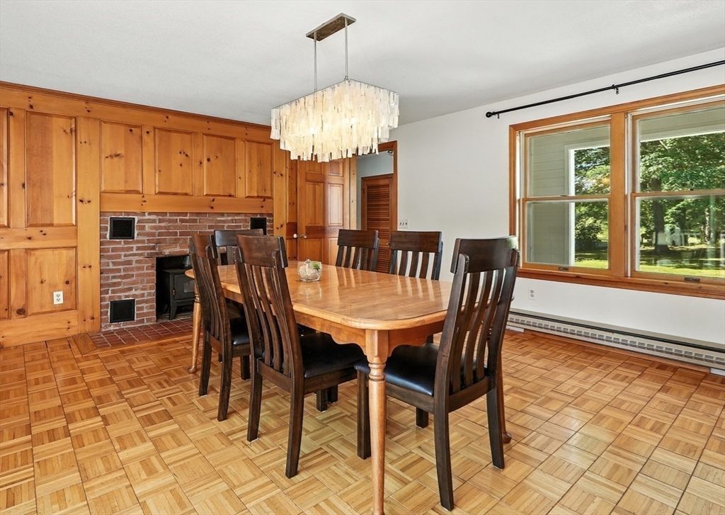 Chandelier, Dining room, Fireplace, Interior, Stone Walls, Wood Texture Flooring