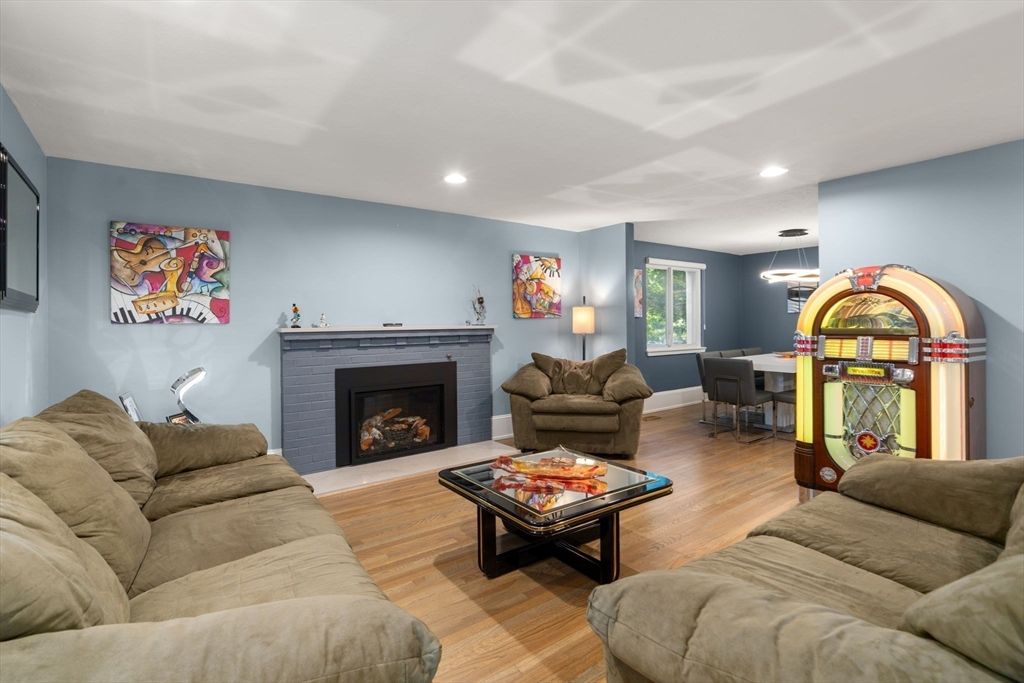 Dining room, Fireplace, Interior, Living room, Pendant Lights, Recessed Lighting, Wood Texture Flooring