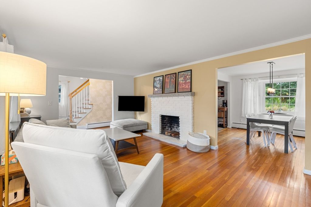 Dining room, Fireplace, Interior, Living room, Pendant Lights, Wood Texture Flooring