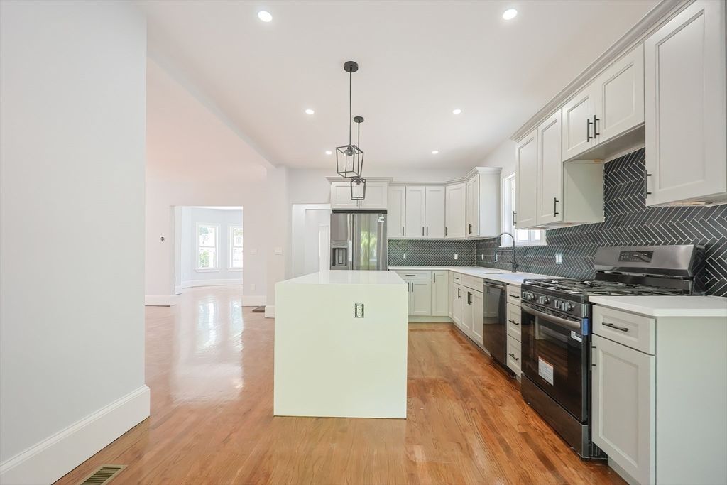Interior, Kitchen, Pendant Lights, Recessed Lighting, Stainless Steel Appliances, Wood Texture Flooring