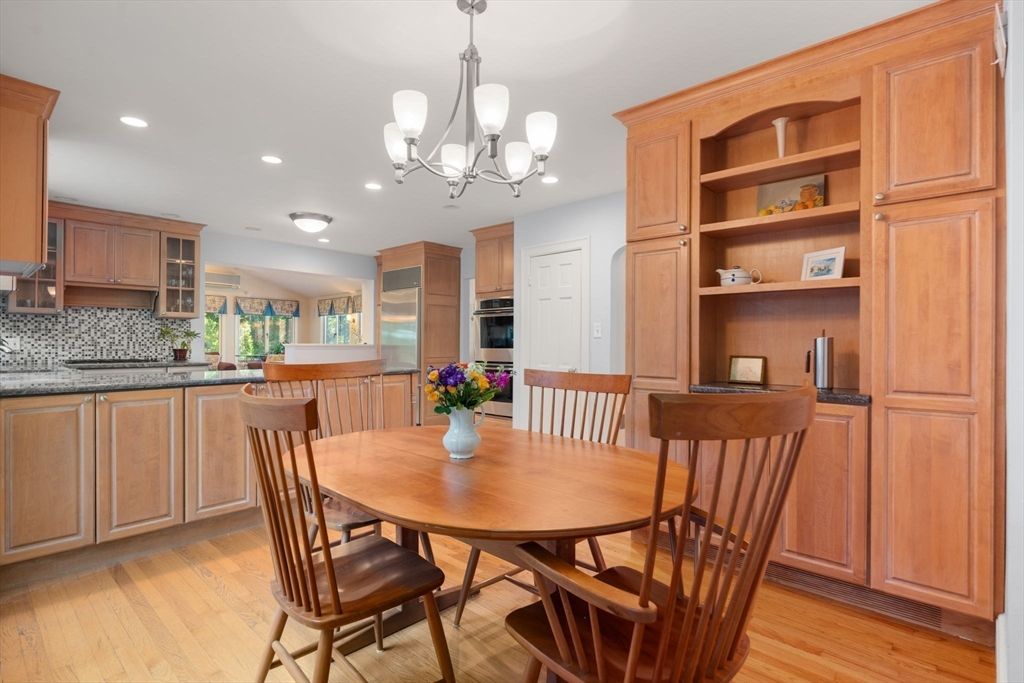 Chandelier, Dining room, Interior, Kitchen, Recessed Lighting, Stainless Steel Appliances, Wood Texture Flooring
