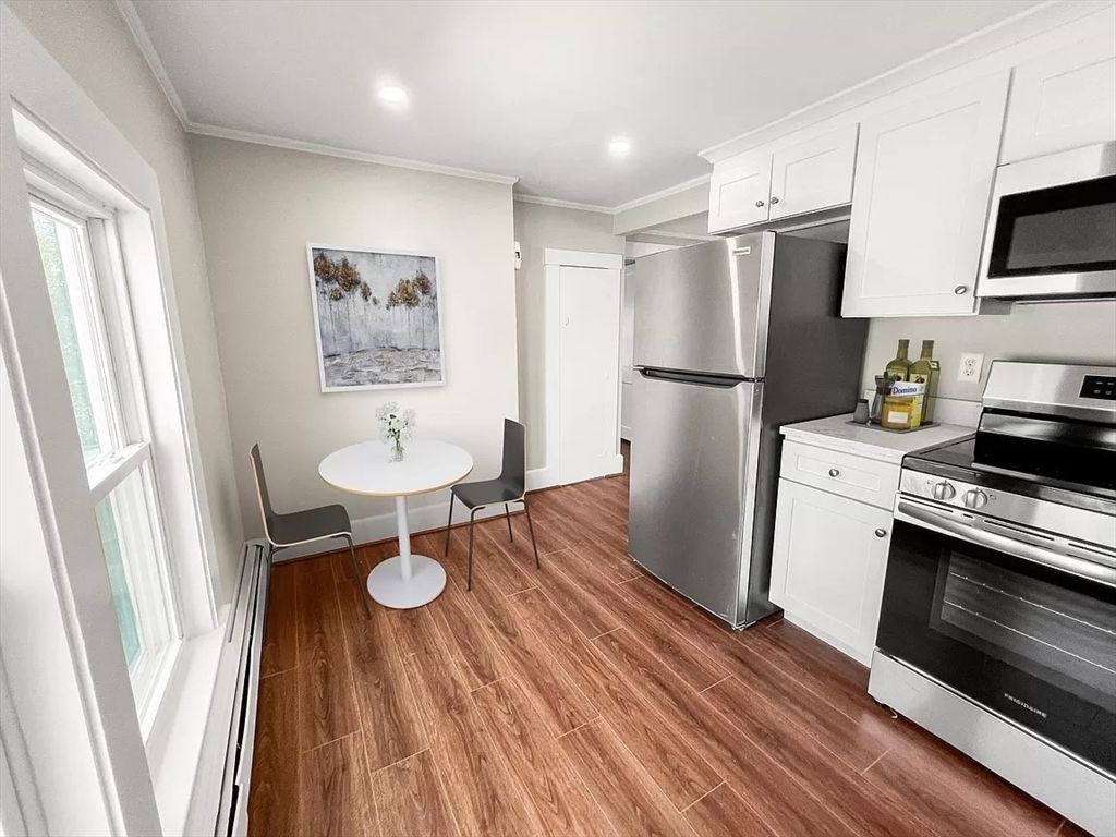 Dining room, Interior, Kitchen, Recessed Lighting, Stainless Steel Appliances, Wood Texture Flooring