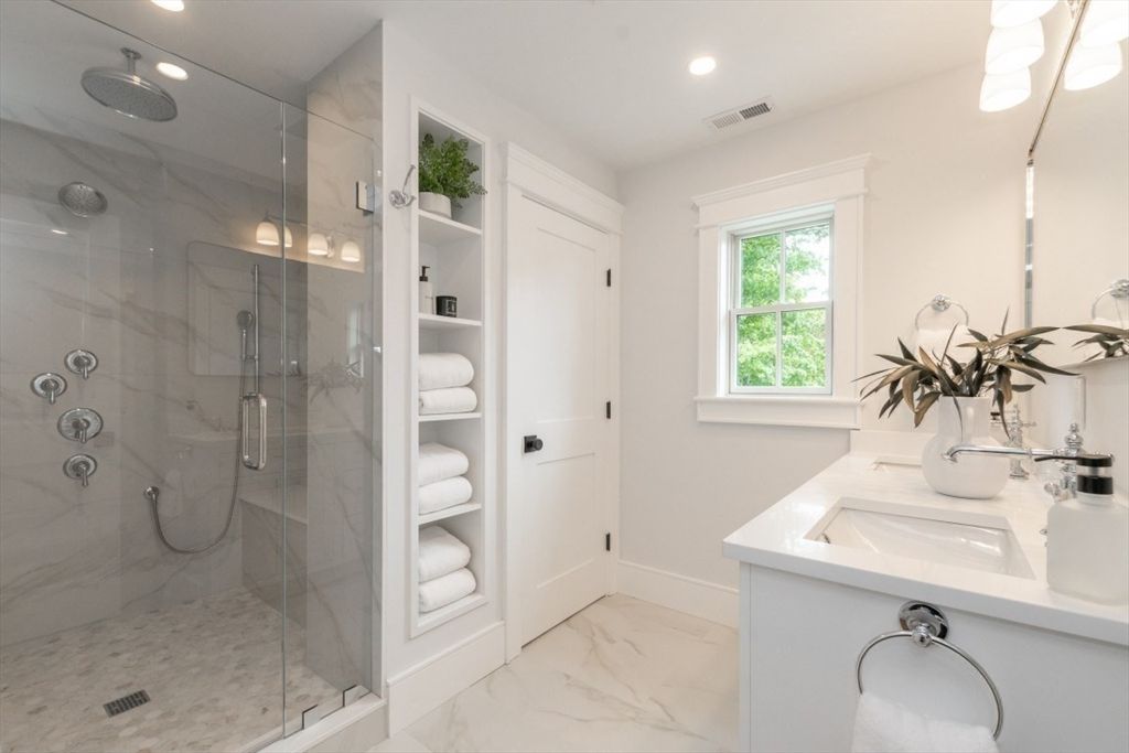 Bathroom, Dual Sink Vanities, Glass Shower, Interior, Marble, Marble Walls, Recessed Lighting