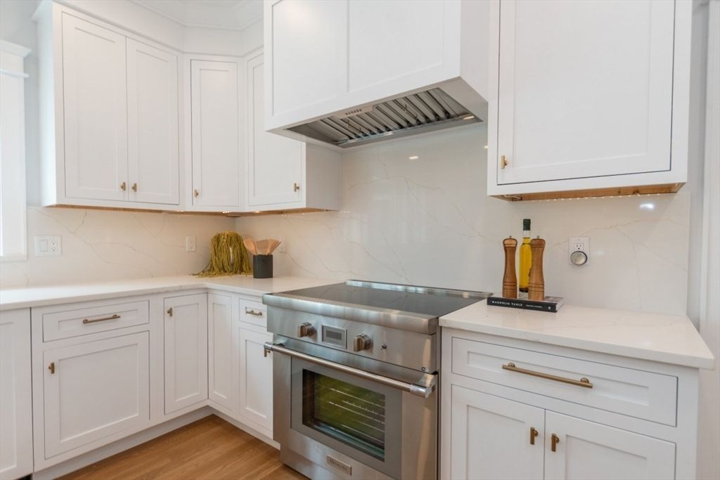 Interior, Kitchen, Marble Walls, Stainless Steel Appliances, Wood Texture Flooring