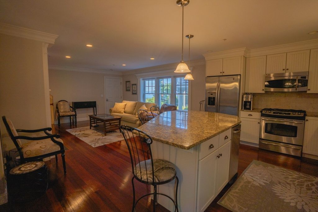 Dining room, Interior, Kitchen, Living room, Pendant Lights, Recessed Lighting, Stainless Steel Appliances, Wood Texture Flooring