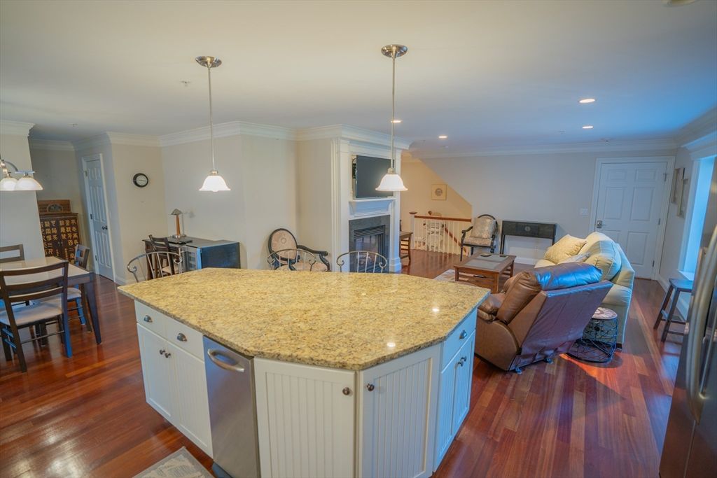 Dining room, Fireplace, Interior, Kitchen, Living room, Pendant Lights, Recessed Lighting, Wood Texture Flooring