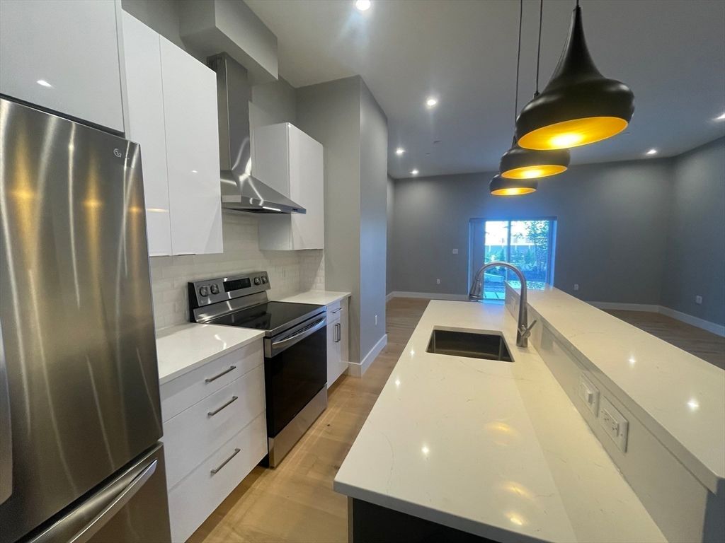 Interior, Kitchen, Pendant Lights, Recessed Lighting, Stainless Steel Appliances, Wood Texture Flooring