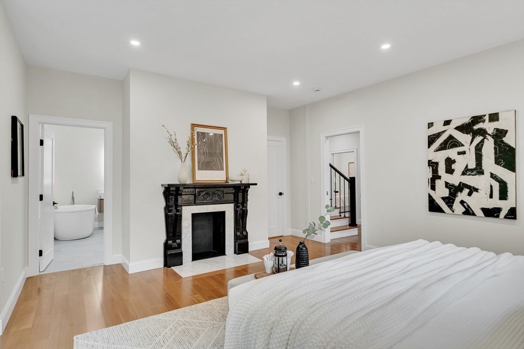 Bedroom, Fireplace, Interior, Recessed Lighting, Wood Texture Flooring