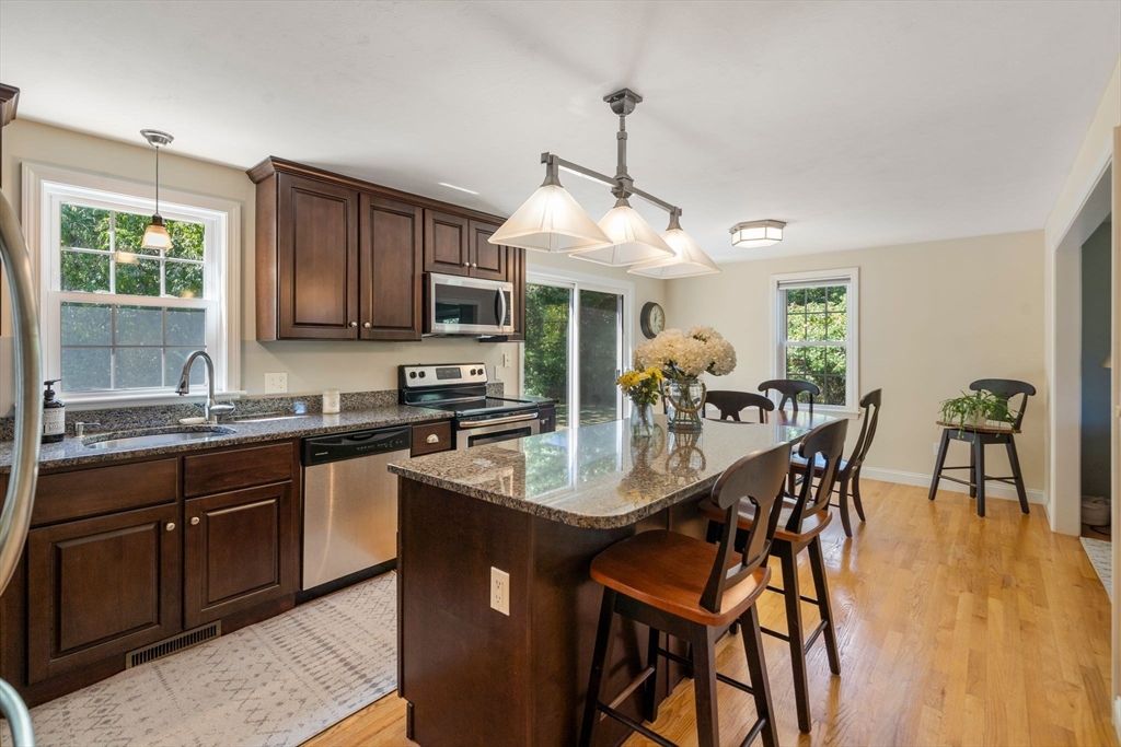 Dining room, Interior, Kitchen, Pendant Lights, Stainless Steel Appliances, Wood Texture Flooring