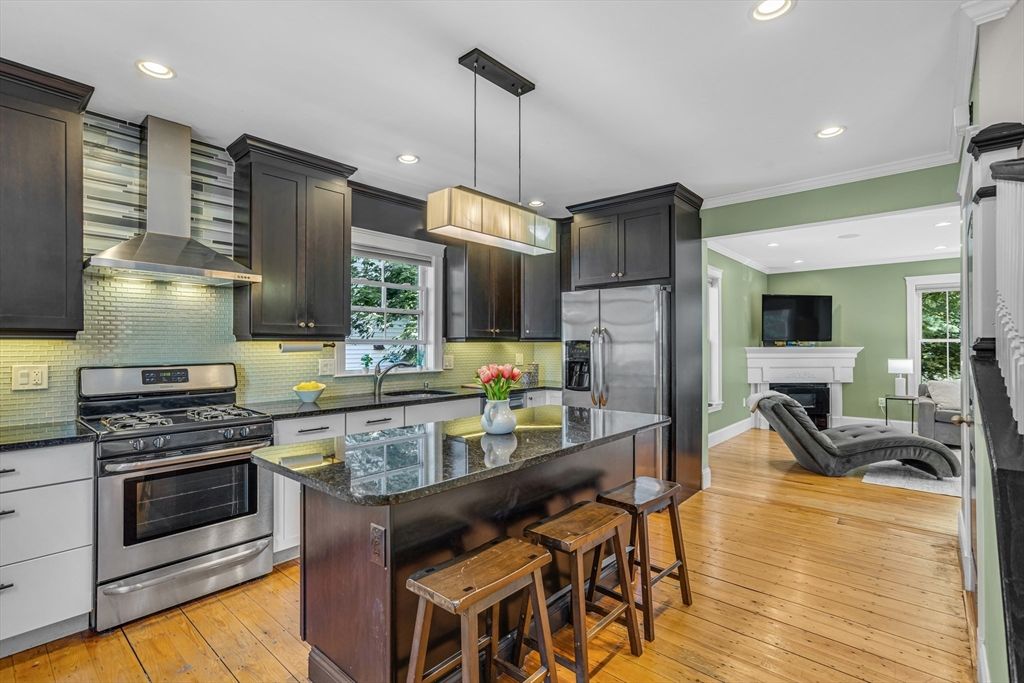 Fireplace, Interior, Kitchen, Pendant Lights, Recessed Lighting, Stainless Steel Appliances, Wood Texture Flooring
