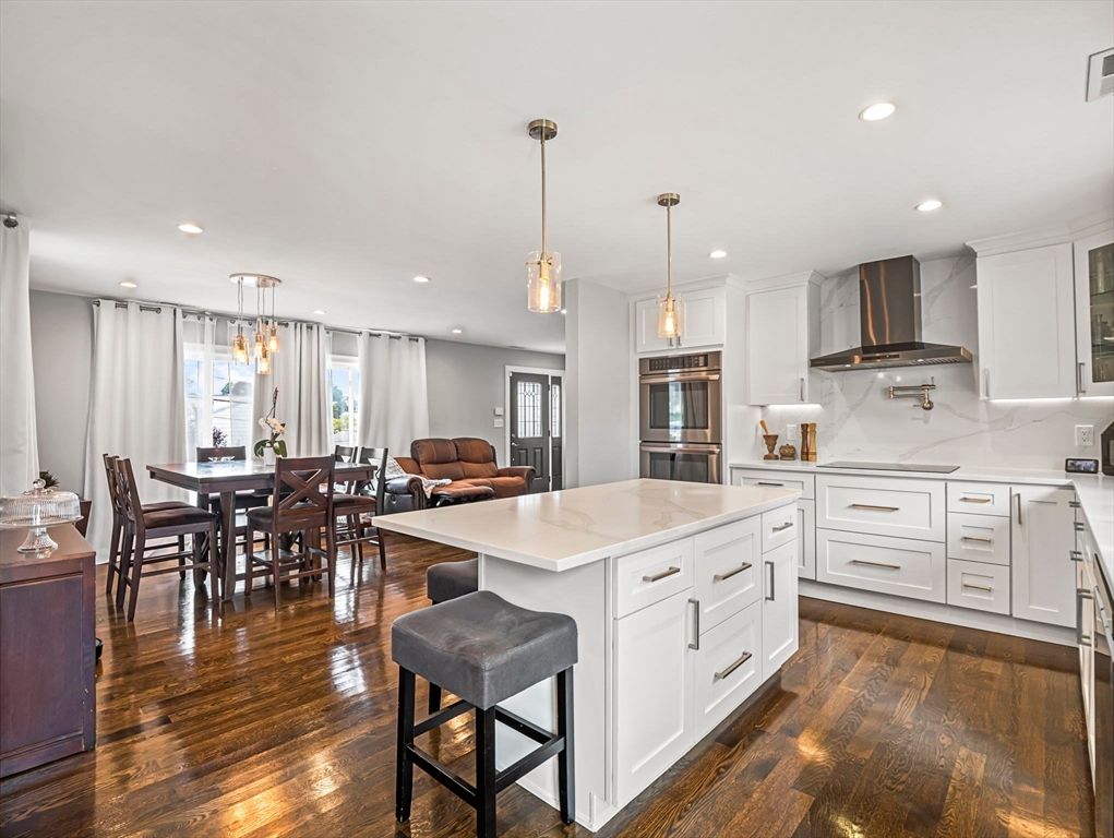 Dining room, Interior, Kitchen, Pendant Lights, Recessed Lighting, Stainless Steel Appliances, Wood Texture Flooring