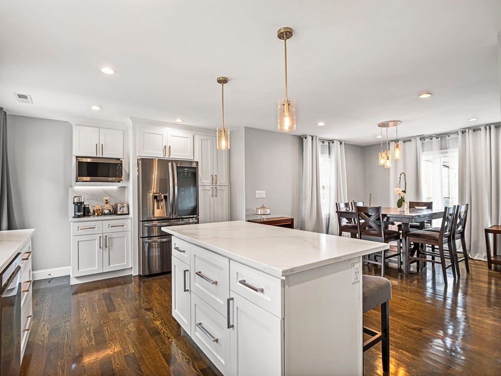 Dining room, Interior, Kitchen, Pendant Lights, Recessed Lighting, Stainless Steel Appliances, Wood Texture Flooring